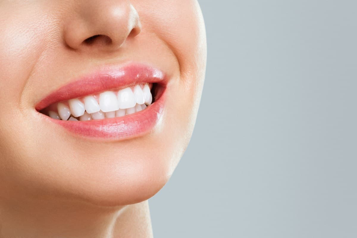 Can a Dentist Place Composite Bonding on a Tooth That Has a Small, Historical Enamel Defect Spot?